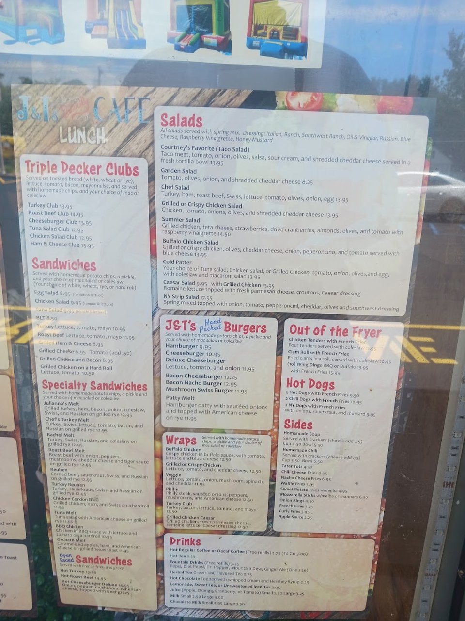 Menu pages showing burgers, wraps, and clubs.